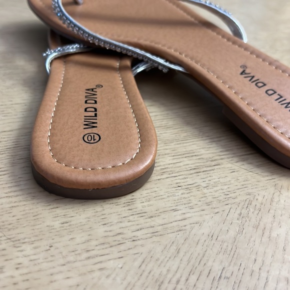 Silver strapped Flip Flops. Flat heels. Size 10 Rhinestone BLING on straps. - Picture 4 of 5